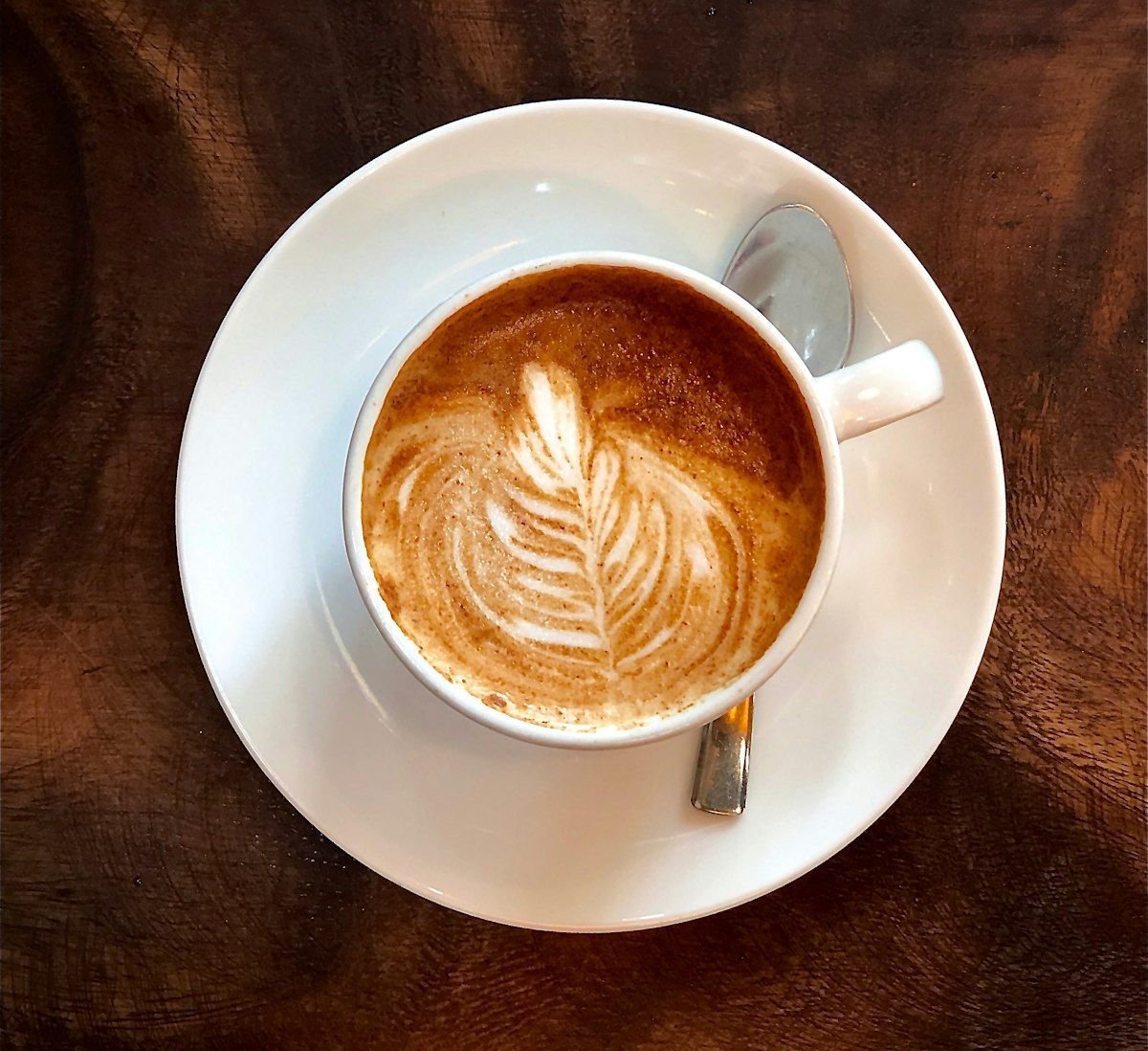 Latte art milk steaming and pitcher control for baristas